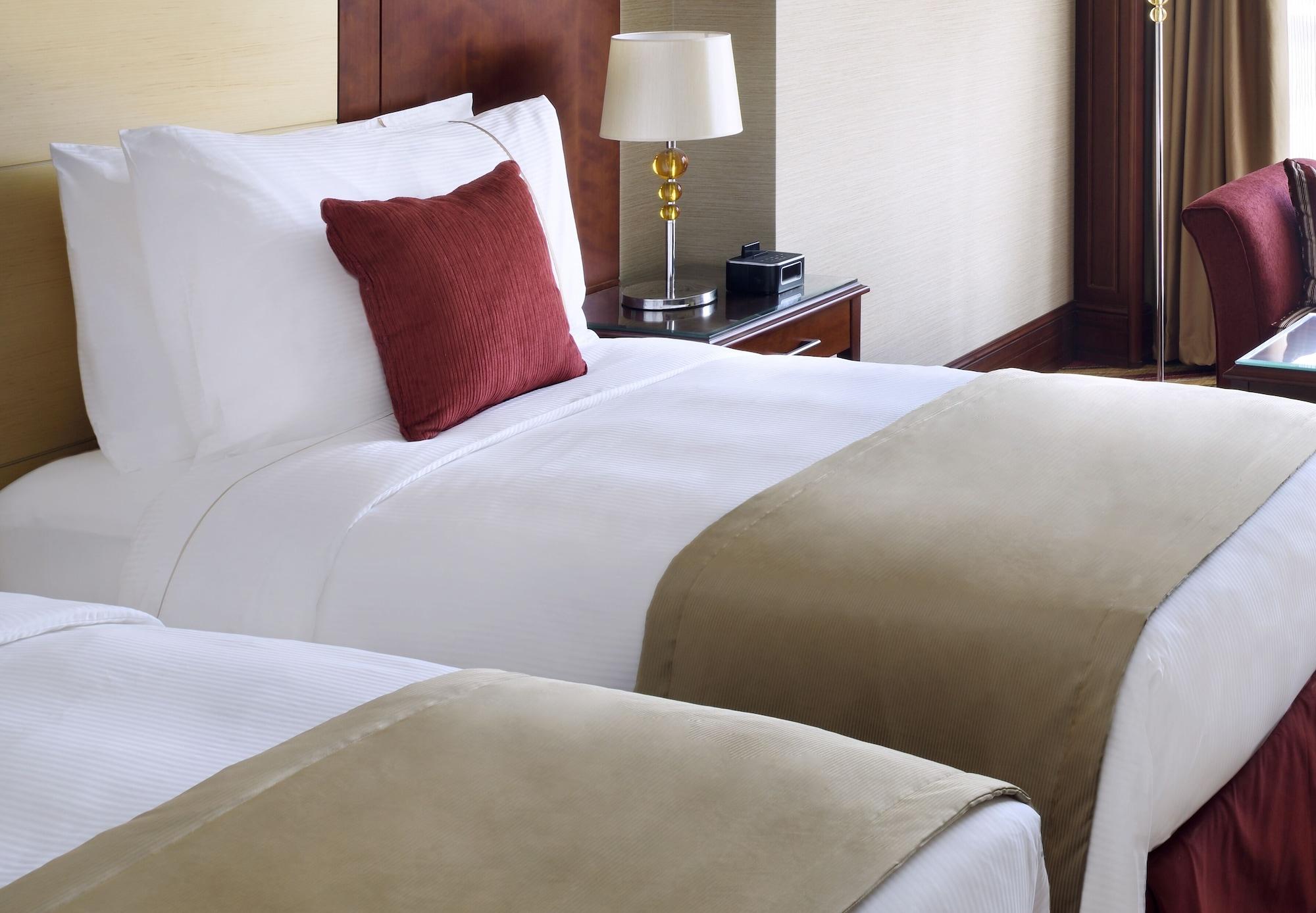 Moevenpick Hotel City Star Yidda Exterior foto A bed runner