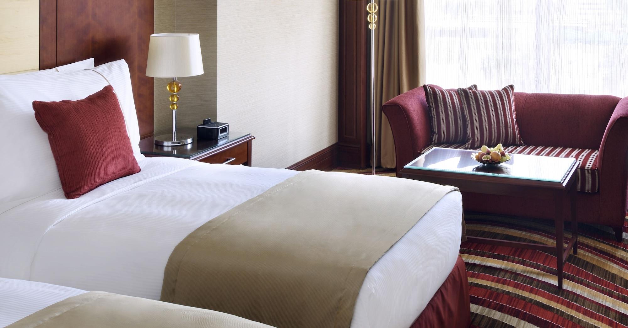 Moevenpick Hotel City Star Yidda Exterior foto A guest room at the hotel