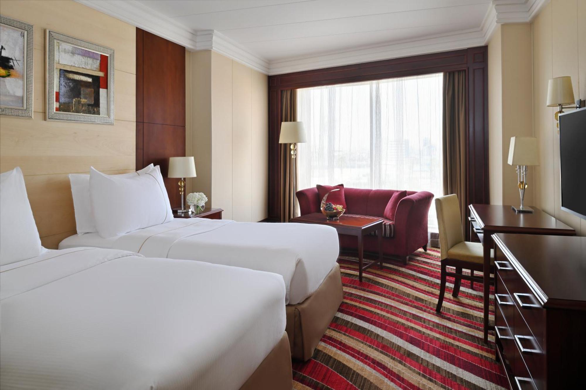 Moevenpick Hotel City Star Yidda Exterior foto A room at the hotel